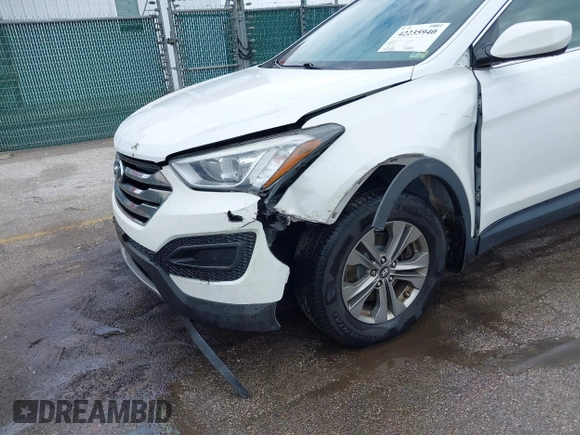 2014 Hyundai Santa Fe z VIN 5XYZTDLB5EG147354, wystawiony jako IAAI lot #42235940 z przebiegiem 107 466 mil mil oraz . Historia ofert i sprzedaży dostępna na DreamBid. Obrazek 6.
