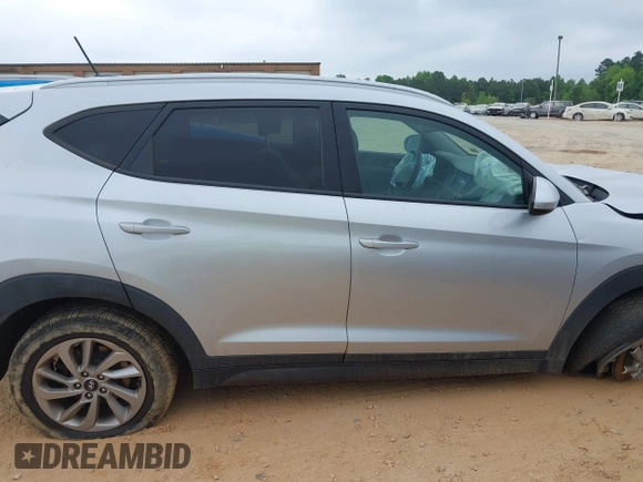 2016 Hyundai Tucson SE z VIN KM8J33A48GU116852, wystawiony jako IAAI lot #42111656 z przebiegiem 138 656 mil mil oraz . Historia ofert i sprzedaży dostępna na DreamBid. Obrazek 13.