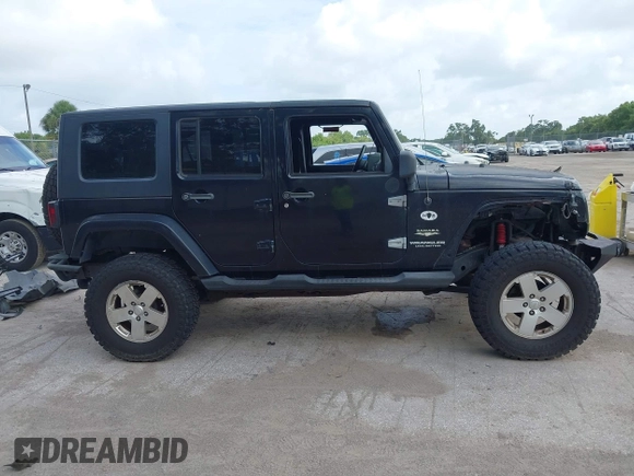 2007 Jeep Wrangler Unlimited Sahara z VIN 1J8GA59187L104774, wystawiony jako IAAI lot #42485359 z przebiegiem 192 254 mil mil oraz . Historia ofert i sprzedaży dostępna na DreamBid. Obrazek 14.