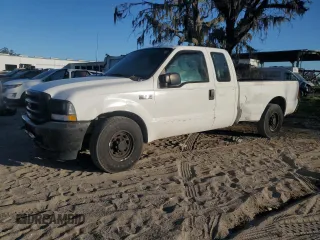 2003 Ford Super Duty F-250 XL with VIN 1FTNX20L73EC70163, listed as a Copart auction lot 77061204 with 387,321 mi miles and Salvage Title. Bid and sale history available at carsss.com. Image 1.