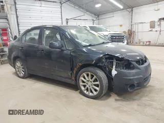 2009 Suzuki SX4 Sport FWD z VIN JS2YC414X96202735, wystawiony jako IAAI lot #42406186 z przebiegiem 181 853 mil mil oraz . Historia ofert i sprzedaży dostępna na DreamBid. Obrazek 1.