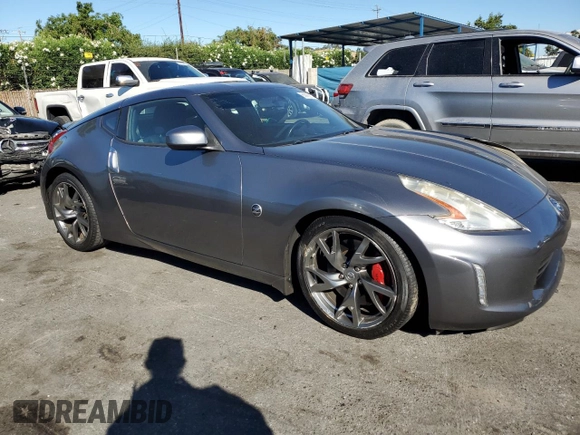 2013 Nissan 370Z with VIN JN1AZ4EH0DM380409, listed as a Copart auction lot 66869114 with 0 mi miles and Salvage Title. Bid and sale history available at carsss.com. Image 4.