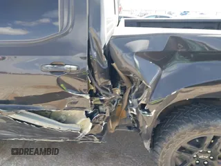 2022 Chevrolet Silverado 1500 RST with VIN 3GCUDEET8NG690038, listed as a IAAI auction lot 41825884 with 53,582 mi miles and . Bid and sale history available at DreamBid. Image 6.