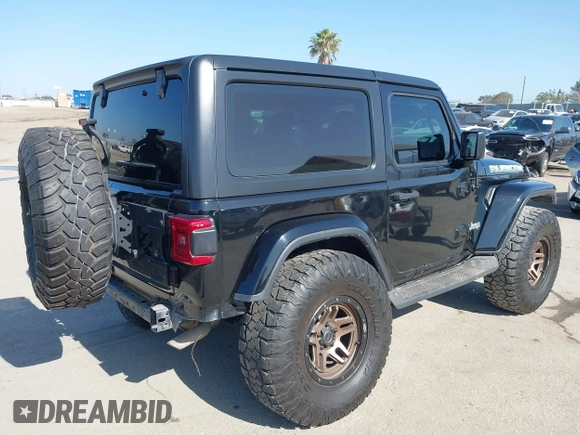 2018 Jeep Wrangler Sport with VIN 1C4GJXANXJW302523, listed as a IAAI auction lot 42527455 with 101,320 mi miles and . Bid and sale history available at DreamBid. Image 4.