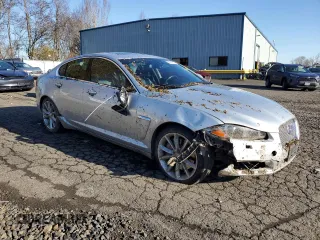 2015 Jaguar XF V6 Portfolio with VIN SAJWA0F7XF8U51105, listed as a Copart auction lot 82865814 with 62,807 mi miles and Salvage Title. Bid and sale history available at carsss.com. Image 4.
