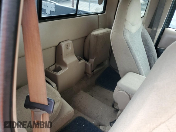 2001 Ford Ranger XLT Appearance with VIN 1FTYR14EX1PB55314, listed as a Copart auction lot 52887535 with 102,270 mi miles and Salvage Title. Bid and sale history available at DreamBid. Image 10.