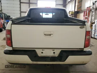 2012 Honda Ridgeline RTL with VIN 5FPYK1F59CB501178, listed as a Copart auction lot 60634535 with 165,766 mi miles and Salvage title. Bid and sale history available at DreamBid. Image 6.