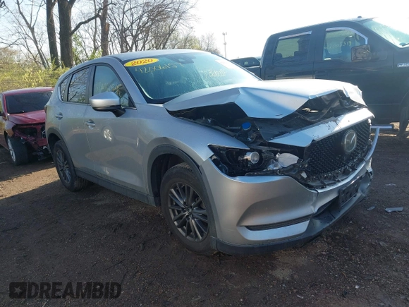 2020 Mazda CX-5 Touring with VIN JM3KFACM5L0766698, listed as a IAAI auction lot 42006157 with 80,288 mi miles and . Bid and sale history available at carsss.com. Image 1.