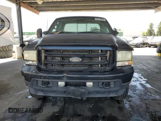 2002 Ford F-250 XL с VIN 1FTNX21F12ED57693, выставлен на аукционе Copart как лот 62148855 с пробегом 149 950 миль миль и Чистый • Clean title. История ставок и продаж доступна на DreamBid. Изображение 5.