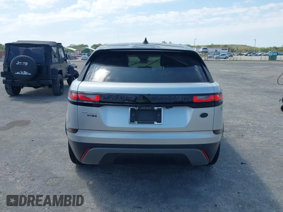 2020 Land Rover Range Rover Velar S z VIN SALYB2EXXLA255258, wystawiony jako IAAI lot #41823002 z przebiegiem 66 527 mil mil oraz . Historia ofert i sprzedaży dostępna na DreamBid. Obrazek 17.