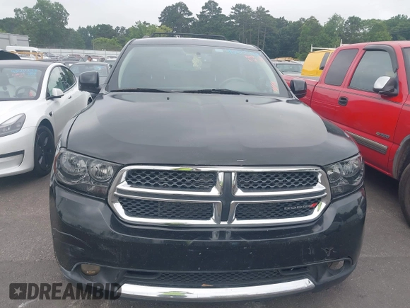 2012 Dodge Durango SXT with VIN 1C4RDJAG4CC314444, listed as a IAAI auction lot 42535630 with 205,494 mi miles and . Bid and sale history available at DreamBid. Image 12.