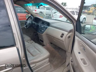 2003 Honda Odyssey EX-L z VIN 5FNRL18063B135949, wystawiony jako IAAI lot #42248105 z przebiegiem 210 567 mil mil oraz . Historia ofert i sprzedaży dostępna na DreamBid. Obrazek 5.
