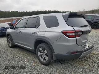 2025 Honda Pilot EX-L with VIN 5FNYG1H40SB002296, listed as a Copart auction lot 87583325 with 6,811 mi miles and Salvage Title. Bid and sale history available at carsss.com. Image 2.