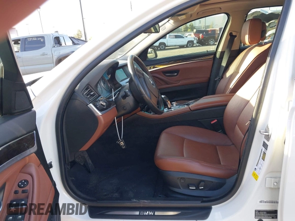 2013 BMW 5 Series 528i with VIN WBAXG5C50DDY34618, listed as a IAAI auction lot 41665956 with 85,088 mi miles and . Bid and sale history available at carsss.com. Image 5.