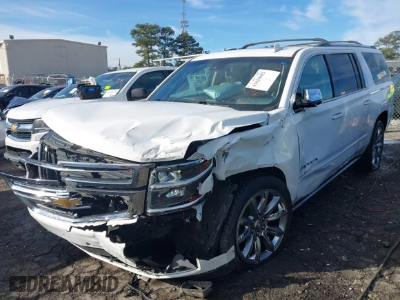 2017 Chevrolet Suburban Premier z VIN 1GNSKJKC9HR117378, wystawiony jako IAAI lot #41610682 z przebiegiem Nie podano mil oraz . Historia ofert i sprzedaży dostępna na DreamBid. Obrazek 17.
