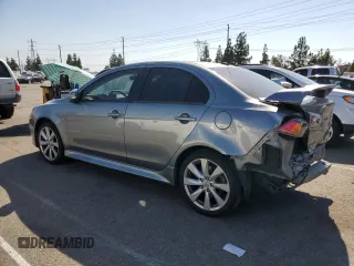 2015 Mitsubishi Lancer GT with VIN JA32U8FW6FU019871, listed as a Copart auction lot 68389694 with 106,523 mi miles and Salvage Title. Bid and sale history available at carsss.com. Image 2.