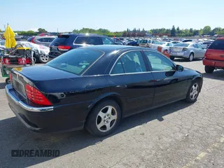 2001 Lincoln LS z VIN 1LNHM86S71Y620289, wystawiony jako IAAI lot #42105386 z przebiegiem 74 148 mil mil oraz . Historia ofert i sprzedaży dostępna na DreamBid. Obrazek 4.