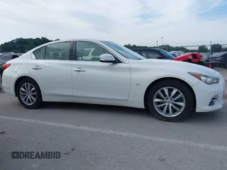 2015 Infiniti Q50 with VIN JN1BV7ARXFM391498, listed as a IAAI auction lot 42538882 with 164,808 mi miles and . Bid and sale history available at DreamBid. Image 13.