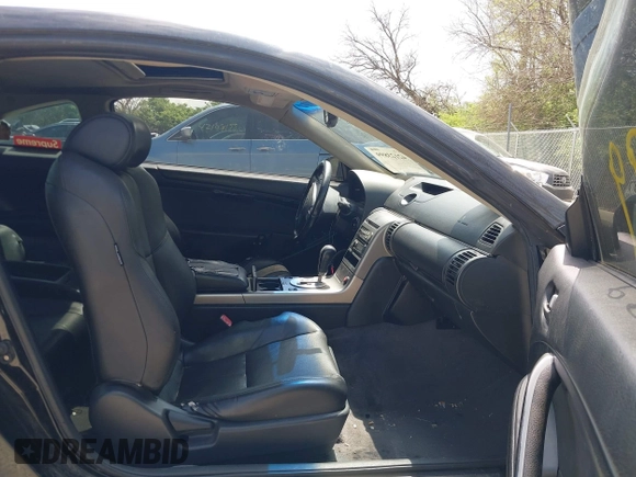 2003 Infiniti G35 Coupe w/Leather with VIN JNKCV54E03M207209, listed as a IAAI auction lot 42123899 with 202,460 mi miles. Bid and sale history available at carsss.com. Image 5.