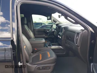 2021 GMC Sierra 1500 AT4 z VIN 1GTP9EELXMZ304412, wystawiony jako IAAI lot #41069878 z przebiegiem 48 987 mil mil oraz . Historia ofert i sprzedaży dostępna na DreamBid. Obrazek 5.