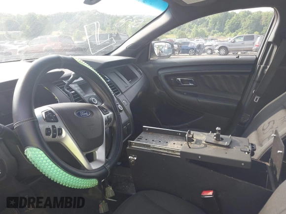 2016 Ford Police Interceptor with VIN 1FAHP2MKXGG101320, listed as a IAAI auction lot 42375375 with 103,640 mi miles and . Bid and sale history available at DreamBid. Image 5.
