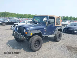 2006 Jeep Wrangler Sport z VIN 1J4FA49S66P708332, wystawiony jako IAAI lot #42402995 z przebiegiem 130 795 mil mil oraz . Historia ofert i sprzedaży dostępna na DreamBid. Obrazek 2.