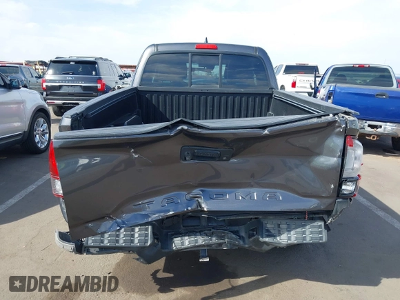 2018 Toyota Tacoma SR with VIN 5TFRX5GN8JX116802, listed as a IAAI auction lot 41879503 with 86,448 mi miles and . Bid and sale history available at DreamBid. Image 17.