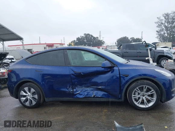 2022 Tesla Model Y Long Range with VIN 7SAYGDEE8NF511395, listed as a IAAI auction lot 41595310 with 65,156 mi miles and . Bid and sale history available at DreamBid. Image 13.