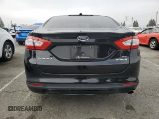 2016 Ford Fusion SE Hybrid with VIN 3FA6P0LU4GR145000, listed as a Copart auction lot 54066805 with 214,658 mi miles and Clean title. Bid and sale history available at DreamBid. Image 6.