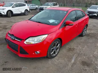 2013 Ford Focus SE with VIN 1FADP3F2XDL291995, listed as a IAAI auction lot 41949607 with 129,298 mi miles. Bid and sale history available at carsss.com. Image 2.