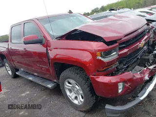 2017 Chevrolet Silverado 1500 LT with VIN 3GCUKREC8HG336120, listed as a IAAI auction lot 41919441 with 64,029 mi miles and . Bid and sale history available at DreamBid. Image 1.