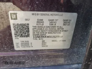 2018 Chevrolet Traverse Premier z VIN 1GNERKKW3JJ127918, wystawiony jako Copart lot #55438525 z przebiegiem 134 336 mil mil oraz Szkoda całkowita • Salvage title. Historia ofert i sprzedaży dostępna na DreamBid. Obrazek 13.