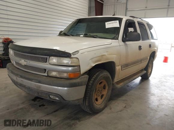 2005 Chevrolet Tahoe LS with VIN 1GNEC13V75J186607, listed as a IAAI auction lot 42090566 with 244,715 mi miles. Bid and sale history available at carsss.com. Image 2.