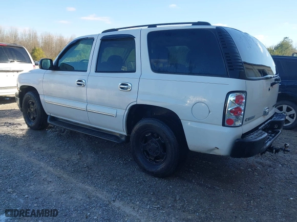 2004 Chevrolet Tahoe LT with VIN 1GNEC13Z54R112847, listed as a IAAI auction lot 41633571 with 234,991 mi miles. Bid and sale history available at carsss.com. Image 3.