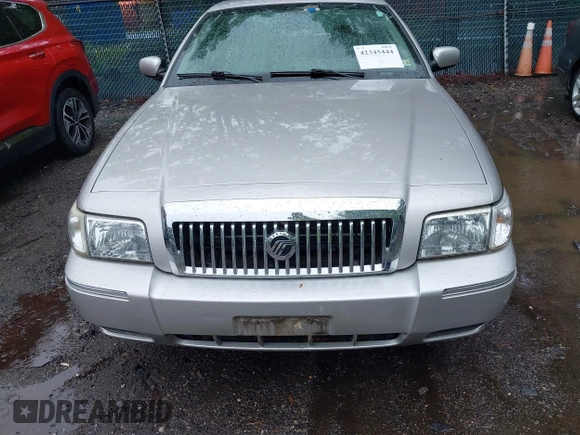 2010 Mercury Grand Marquis LS z VIN 2MEBM7FV5AX606629, wystawiony jako IAAI lot #42345444 z przebiegiem 66 600 mil mil oraz . Historia ofert i sprzedaży dostępna na DreamBid. Obrazek 6.