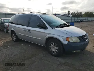 2004 Chrysler Town & Country Touring with VIN 2C4GP54L64R591488, listed as a Copart auction lot 71757554 with 169,116 mi miles and Salvage Title. Bid and sale history available at DreamBid. Image 4.