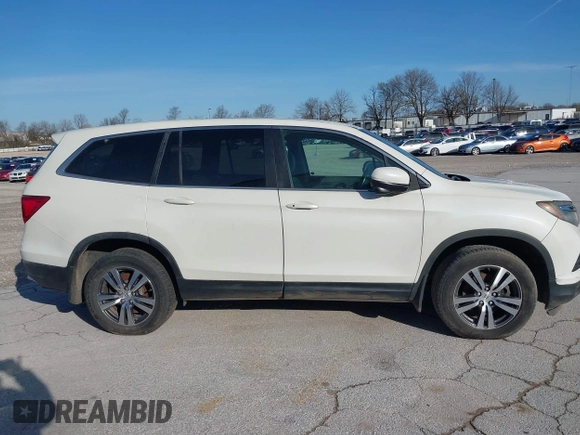 2016 Honda Pilot EX-L with VIN 5FNYF5H5XGB016152, listed as a IAAI auction lot 41820023 with 210,474 mi miles and . Bid and sale history available at DreamBid. Image 14.