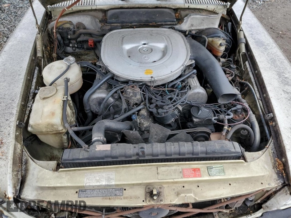 1982 Mercedes-Benz 380 SL z VIN WDBBA45A7CB016184, wystawiony jako Copart lot #72085954 z przebiegiem 251 411 mil mil oraz Szkoda całkowita • Salvage title. Historia ofert i sprzedaży dostępna na DreamBid. Obrazek 11.