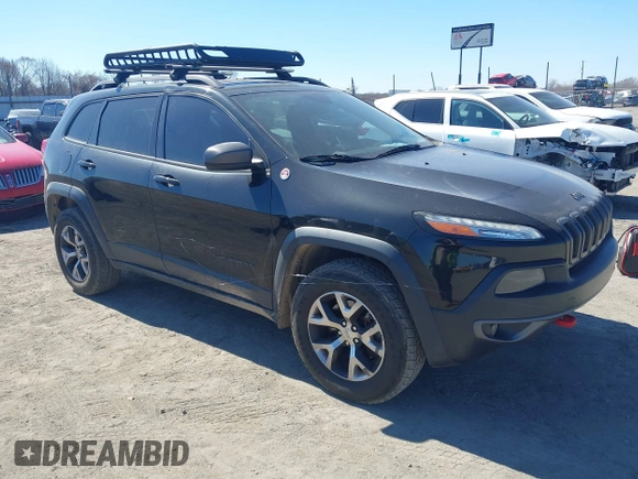 2015 Jeep Cherokee Trailhawk with VIN 1C4PJMBS5FW577470, listed as a IAAI auction lot 41565837 with 191,105 mi miles. Bid and sale history available at carsss.com. Image 13.