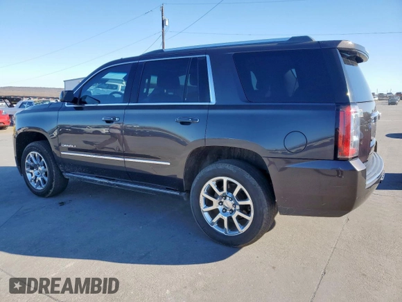 2015 GMC Yukon Denali with VIN 1GKS1CKJ7FR132677, listed as a Copart auction lot 47820925 with 144,821 mi miles and Salvage Title. Bid and sale history available at carsss.com. Image 2.