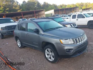 2011 Jeep Compass Latitude with VIN 1J4NT1FB4BD260158, listed as a IAAI auction lot 42013286 with 326,493 mi miles. Bid and sale history available at carsss.com. Image 6.
