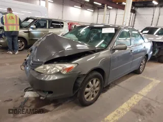 2003 Toyota Camry LE with VIN 4T1BE32K13U754348, listed as a IAAI auction lot 41765418 with 194,227 mi miles and . Bid and sale history available at DreamBid. Image 18.
