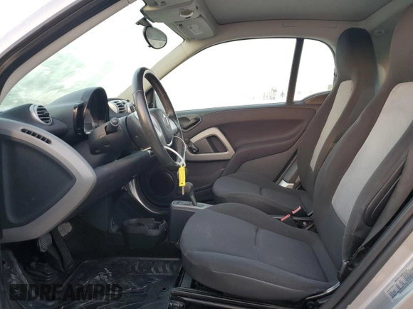 2011 Smart fortwo Pure с VIN WMEEJ3BAXBK421243, выставлен на аукционе Copart как лот 78536584 с пробегом 64 858 миль миль и На запчасти • Non repairable. История ставок и продаж доступна на DreamBid. Изображение 7.