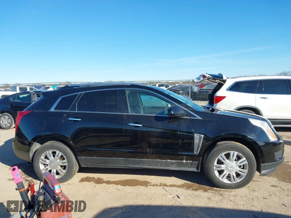 2016 Cadillac SRX Luxury Collection with VIN 3GYFNEE39GS583306, listed as a IAAI auction lot 41312161 with 98,831 mi miles. Bid and sale history available at carsss.com. Image 13.