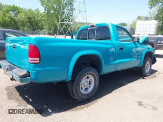 1997 Dodge Dakota z VIN 1B7GG26Y5VS253054, wystawiony jako IAAI lot #42215925 z przebiegiem 125 768 mil mil oraz . Historia ofert i sprzedaży dostępna na DreamBid. Obrazek 4.
