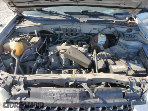 2005 Ford Escape Limited с VIN 1FMYU941X5KB52194, выставлен на аукционе Copart как лот 48726645 с пробегом Не указан миль и Списание • Salvage title. История ставок и продаж доступна на DreamBid. Изображение 12.