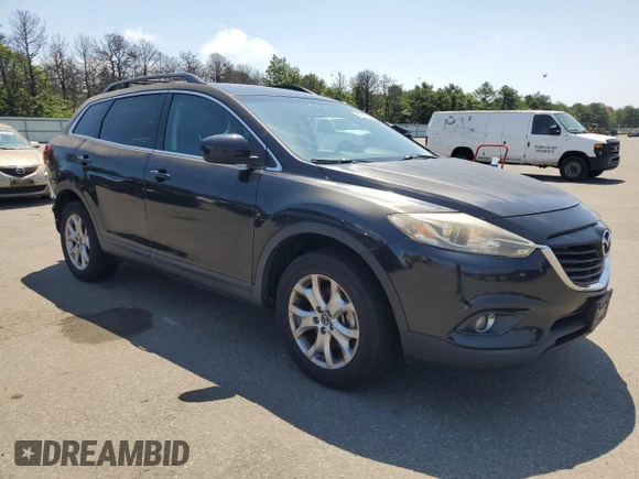 2015 Mazda CX-9 Touring with VIN JM3TB3CV8F0464265, listed as a Copart auction lot 64359885 with 95,980 mi miles and Salvage title. Bid and sale history available at DreamBid. Image 4.