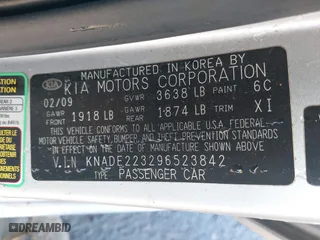 2009 Kia Rio SX with VIN KNADE223296523842, listed as a IAAI auction lot 42024905 with 98,613 mi miles. Bid and sale history available at carsss.com. Image 9.