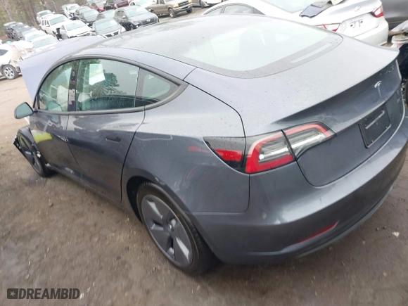 2023 Tesla Model 3 with VIN 5YJ3E1EA7PF642913, listed as a IAAI auction lot 41898249 with 26,394 mi miles. Bid and sale history available at carsss.com. Image 3.