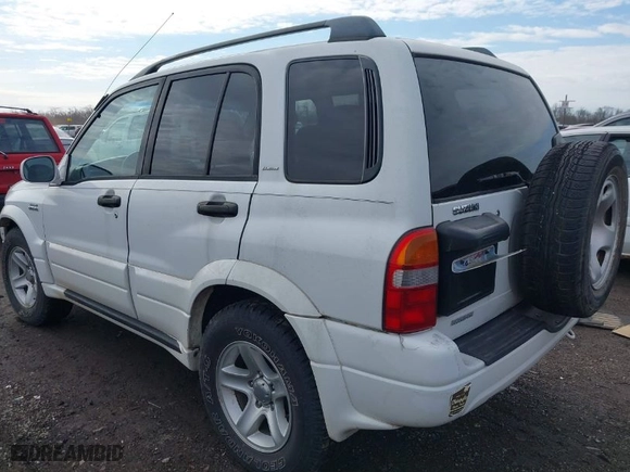 2001 Suzuki Grand Vitara JLX with VIN JS3TD62V114157738, listed as a IAAI auction lot 41721813 with 134,661 mi miles. Bid and sale history available at carsss.com. Image 3.